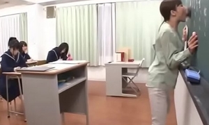 Japanese teacher gives a opportune lesson before blackboard
